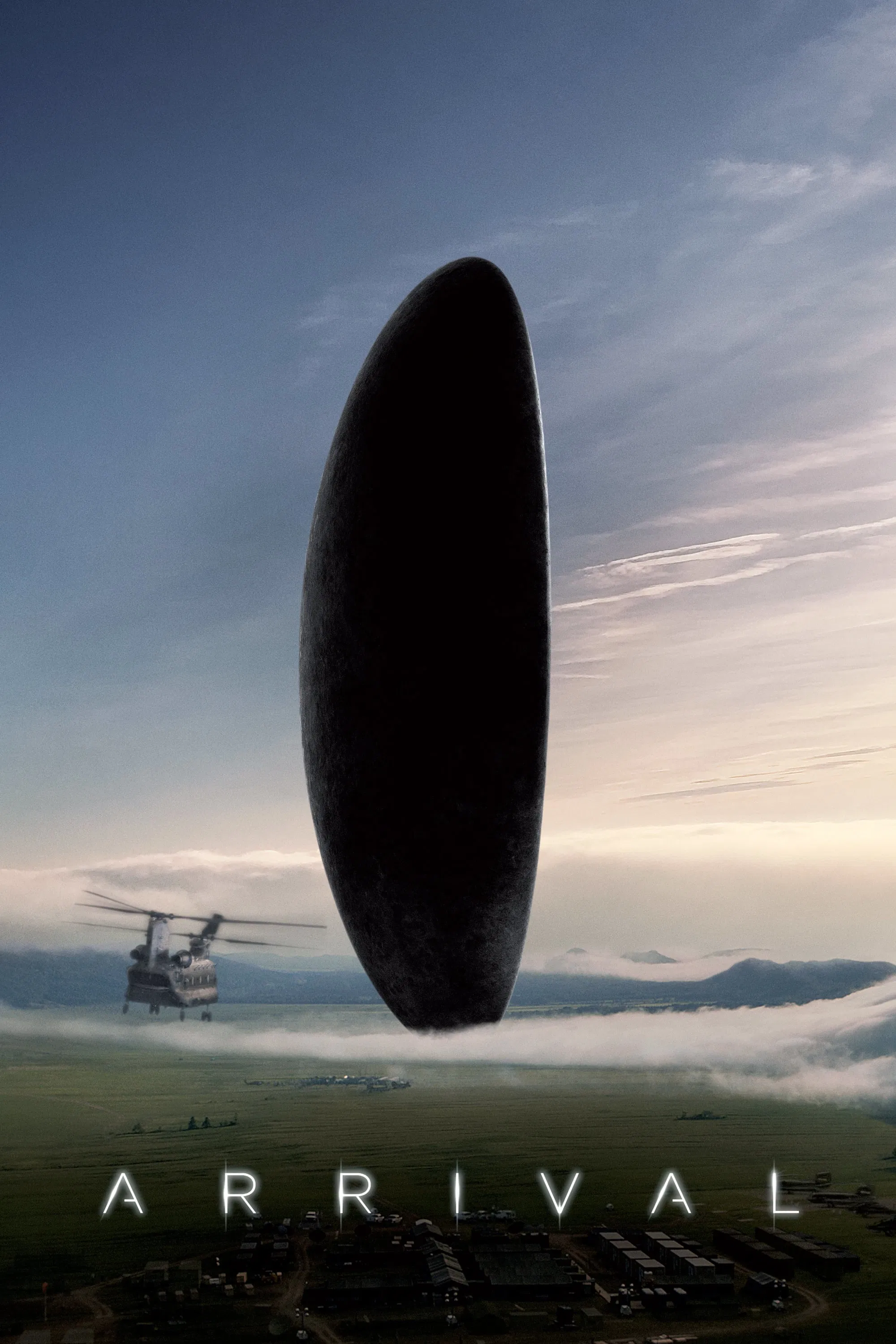 Arrival (2016) poster — the heptapod shell hovering over a Montana field